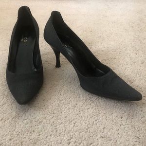 Gucci black pointed heels.
